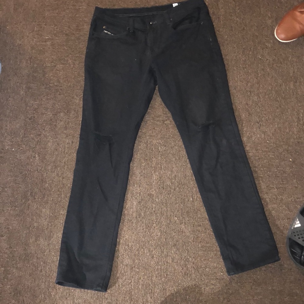 wide knee torn black jeans